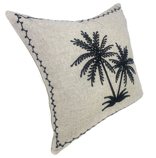 Natural cushion with black twin palm trees embroidered side view