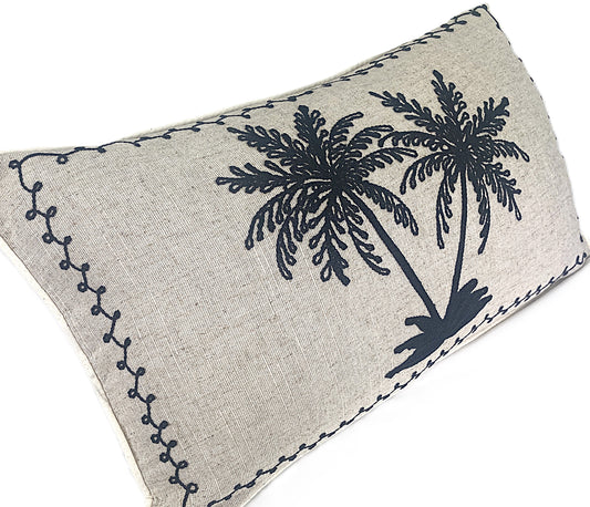 Decorative black embroidered palm cushion on natural background cotton linen blend 50x30cm side view