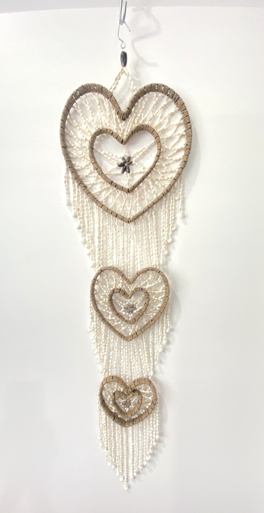 Decorative wall hanging with heart shapes. Handmade Wall Art