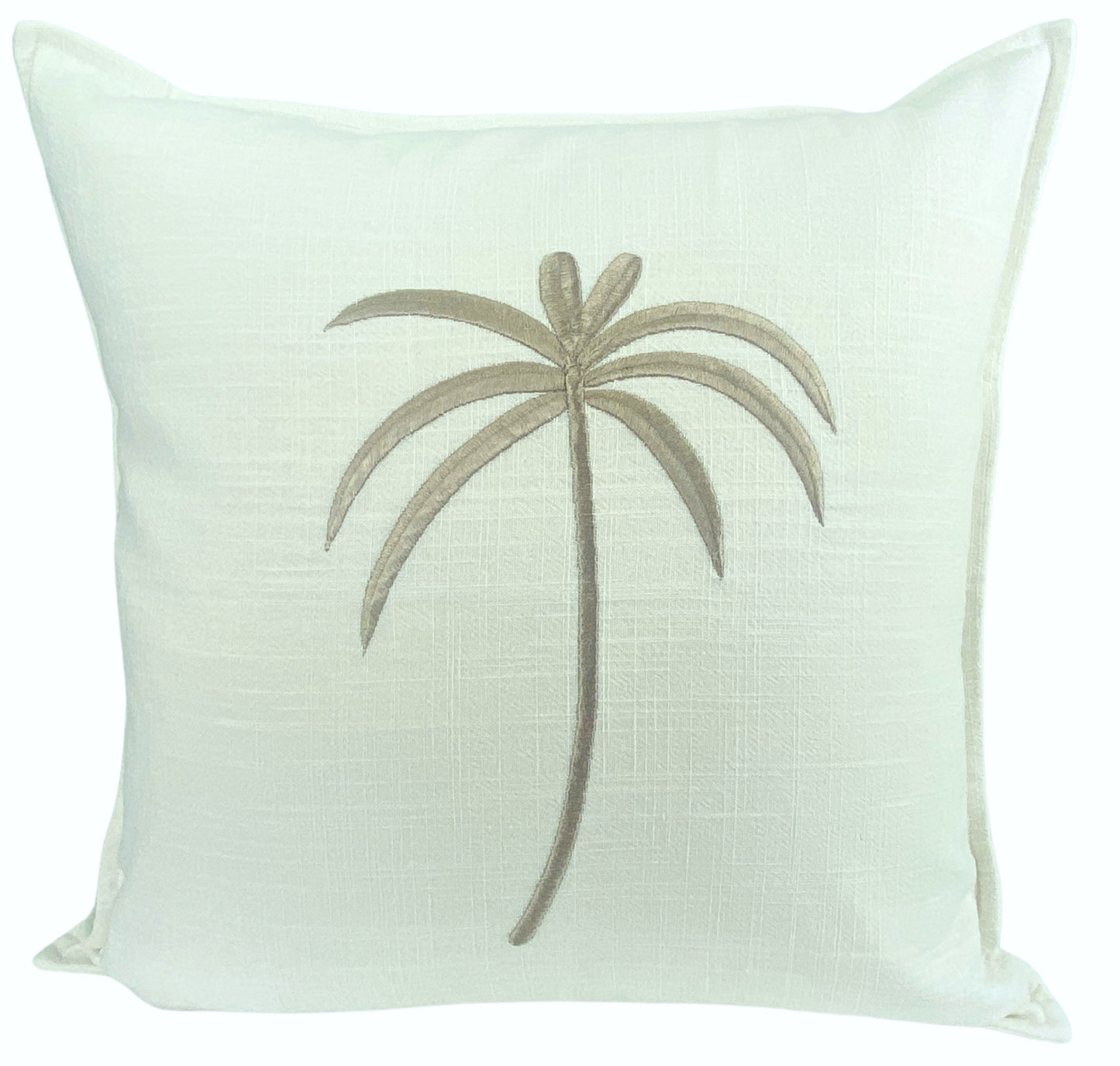 White pillow with a embroidered palm tree design on a white background