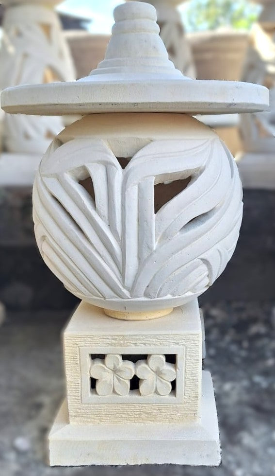 Balinese garden lantern with intricate cutwork patterns