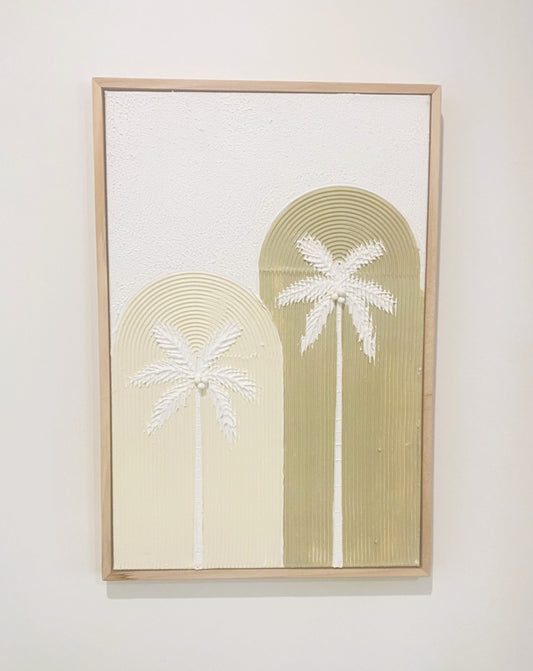 Framed textured artwork with twinpalm tree design in neutral colours on a plain wall