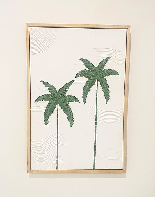 Framed textured artwork with green palm tree design on a white background