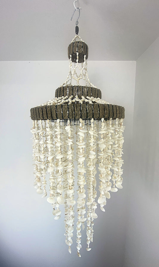 Shell Chandelier with 3 Jute wrapped hoops. Shell strands cascading down in three tiers
