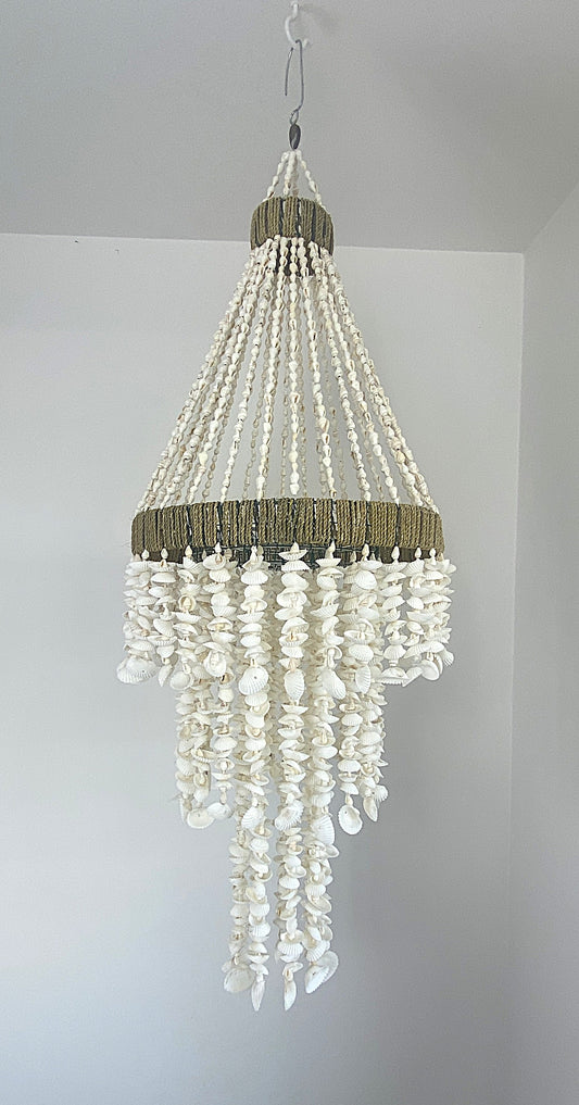 Diamond shaped Shell Chandelier with hand strung strands of textured and smooth shells 