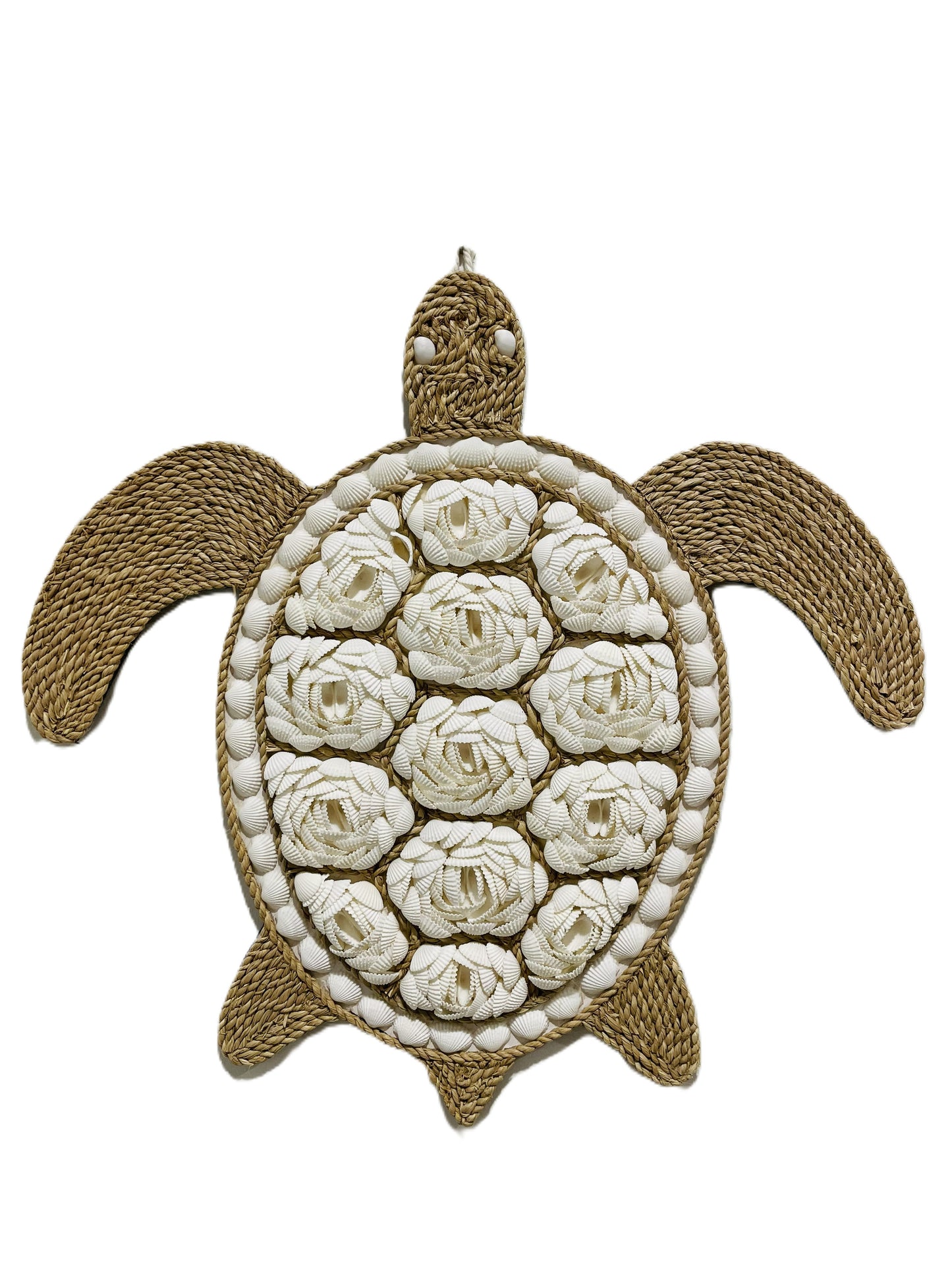 Decorative turtle wall art with white shell floral patterns on a beige background