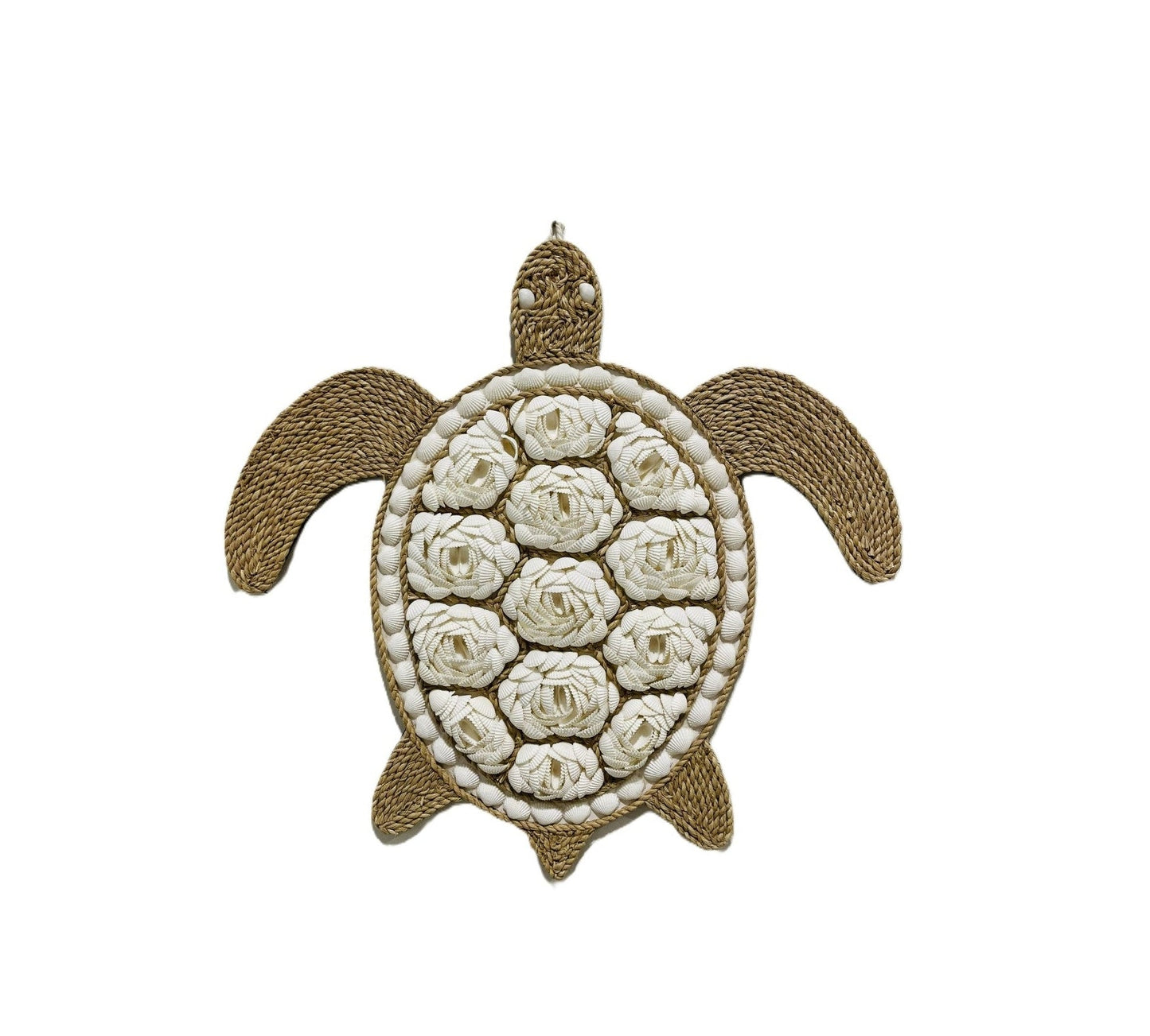 Decorative turtle wall art with white shell floral pattern on a white background