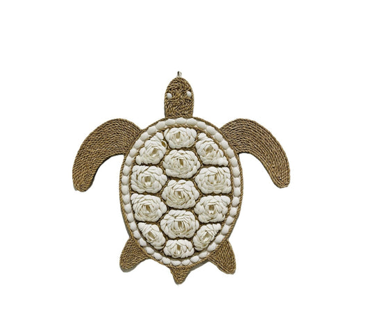 Decorative turtle wall art with white shell floral pattern on a white background